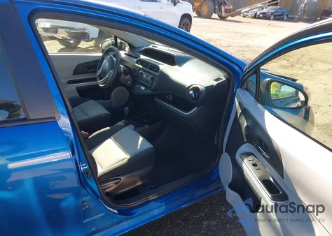 2014 Toyota Prius C Two from USA, damaged, VIN JTDKDTB37E1084311